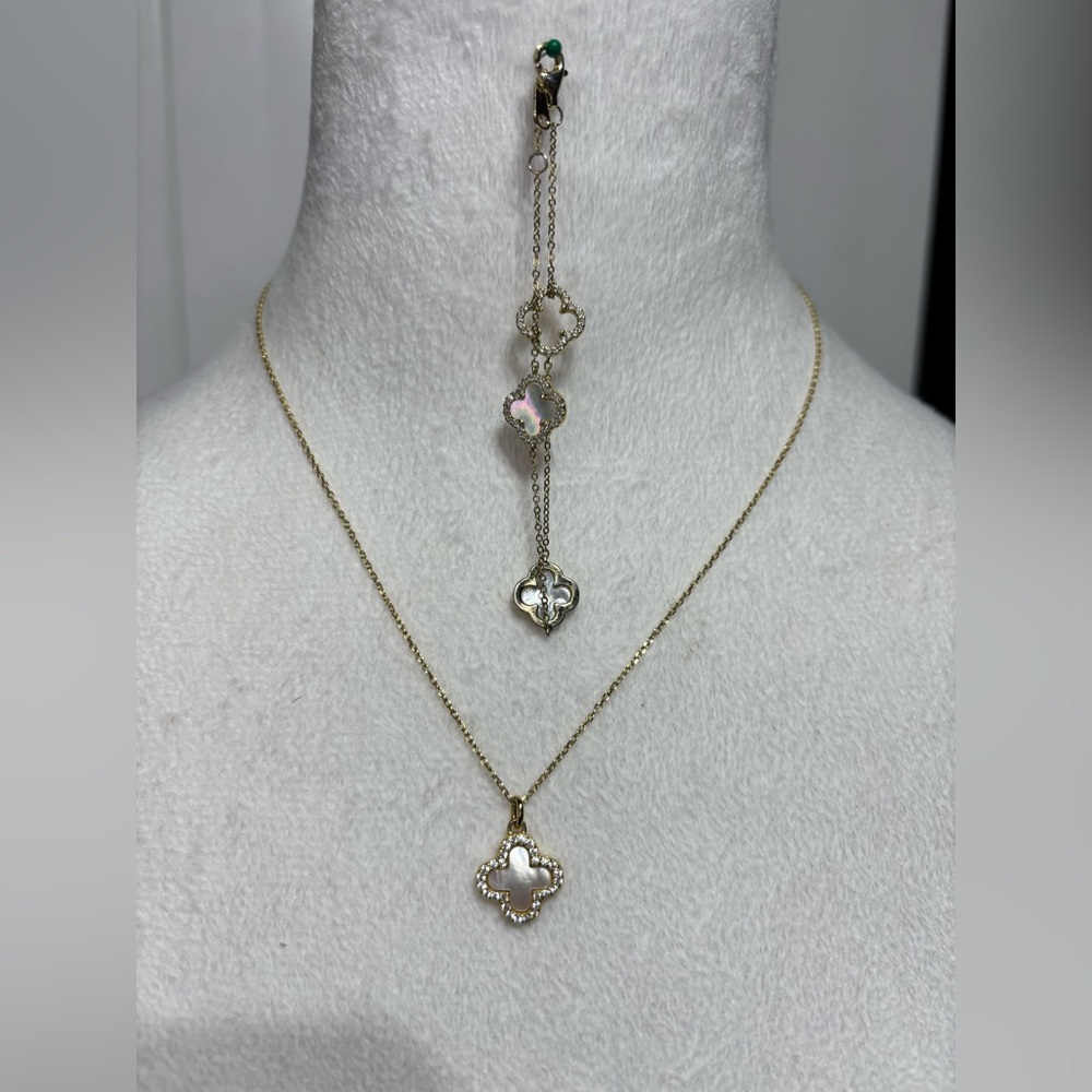 New white clover and crystal gold tone necklace and bracelet set